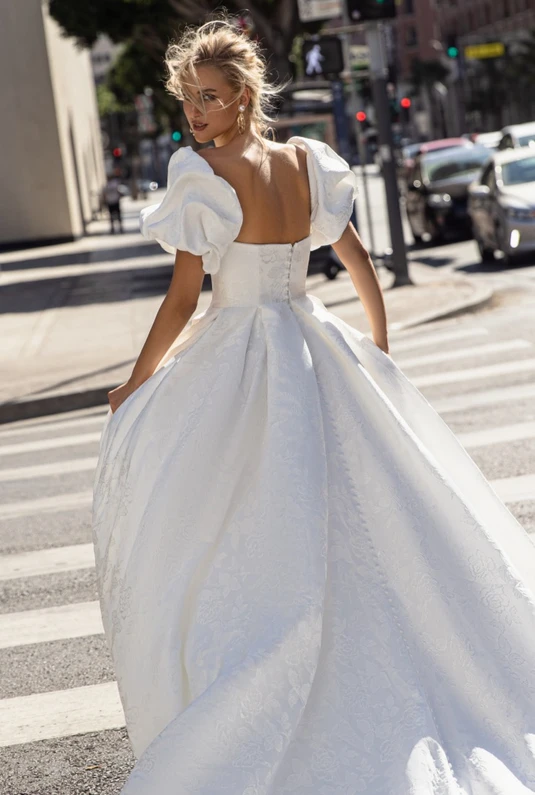 a girl wearing wedding dress